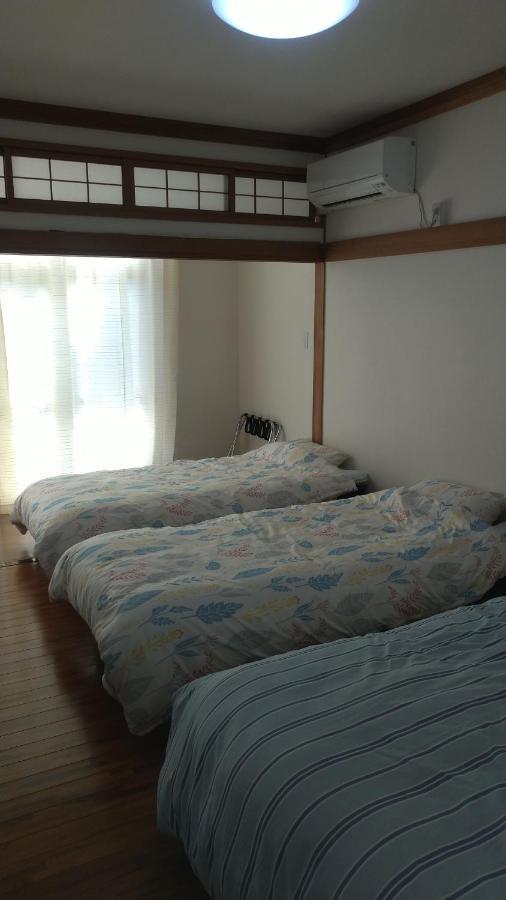 Kami House Hotel Amami Quarto foto